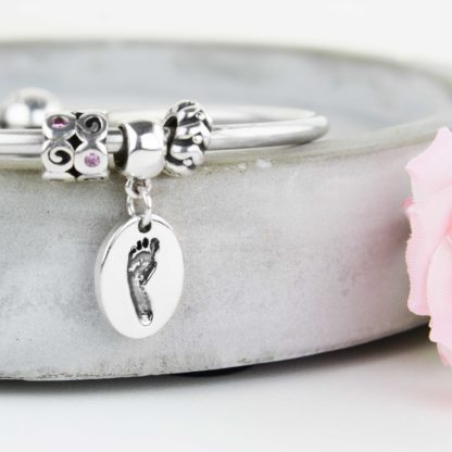 personalised-sterling-silver-Oval-footprint-charm-bracelet