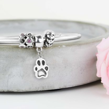 personalised-sterling-silver-sculpted-pawprint-charm-bracelet