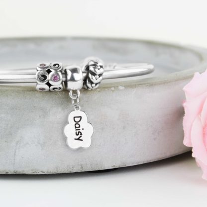 personalised-sterling-silver-sculpted-pawprint-text-charm-bracelet