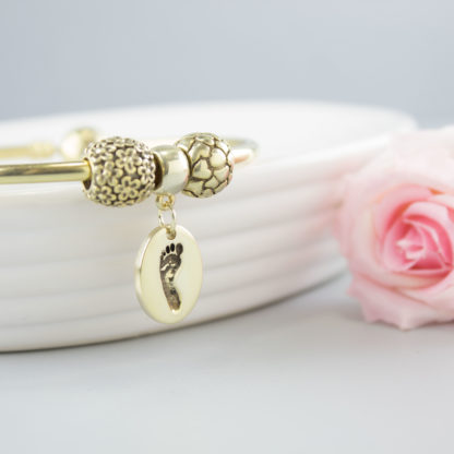personalised-gold-oval-charm-footprint-bracelet
