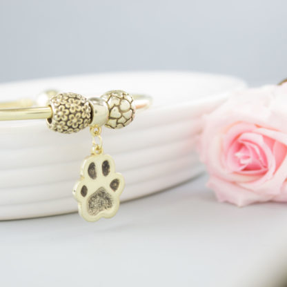 personalised-memorial-gold-sculpted-charm-pawprint-bracelet