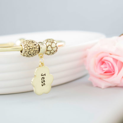 personalised-memorial-gold-sculpted-charm-pawprint-rear-text-bracelet