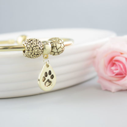 personalised-memorial-gold-teardrop-charm-pawprint-bracelet