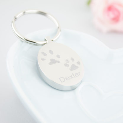 personalised-memorial-stainless-steel-engraved-2-pawprint-1-name-oval-keyring