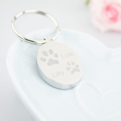 personalised-memorial-stainless-steel-engraved-2-pawprint-2-name-oval-keyring